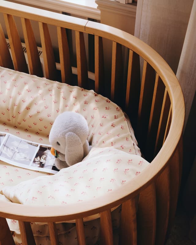 Sol Baby baby crib showcasing solid wood craftsmanship