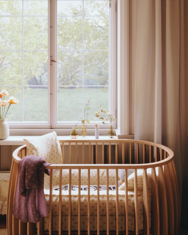 Sol Baby Olga wooden crib close-up in a cozy nursery